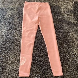 Baby pink color with while elephant on one leg. Worn once, great condition!
